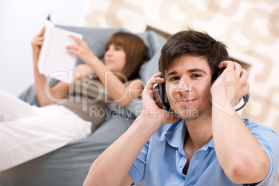 Student - Teenager man relaxing with headphones