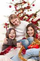 Three young women having fun on Christmas