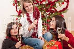 Three young women having fun on Christmas