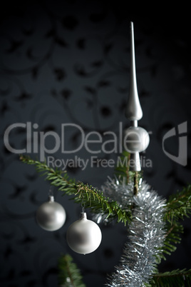 Silver decorated Christmas tree with balls and chains