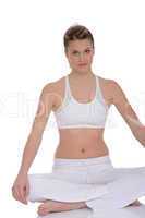 Fitness - Young woman in yoga position on white