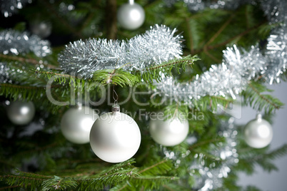 Silver decorated Christmas tree with balls and chains