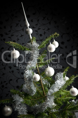 Silver decorated Christmas tree with balls and chains