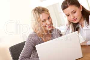 Student series - Two girls sitting at laptop