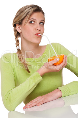 Healthy lifestyle series - Woman drinking orange