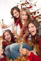 Four young woman having fun on Christmas