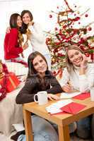 Four young women having fun on Christmas