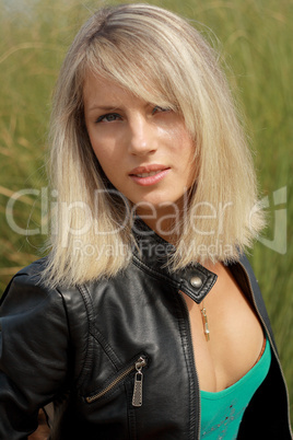 blonde girl in black jacket