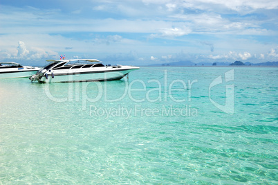 Motor boats on turquoise water of Indian Ocean, Phi Phi island,