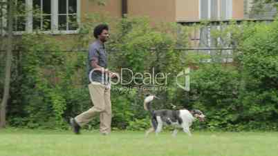 Man walking his dog at the park
