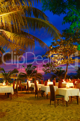 Outdoor restaurant at the beach during sunset, Phuket, Thailand