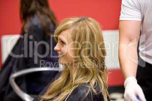 Blond woman having her hair dye