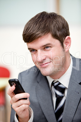 businessman sending a text message