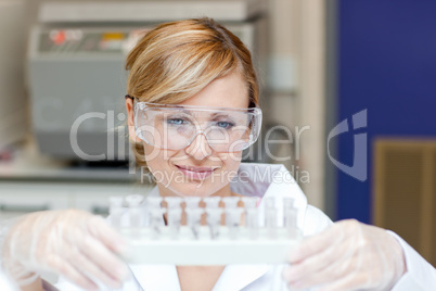 Concentrated caucasian female scientist