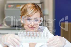 Concentrated caucasian female scientist