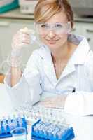 female scientist holding samples