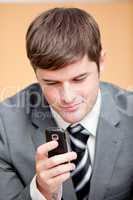 businessman writing a text message
