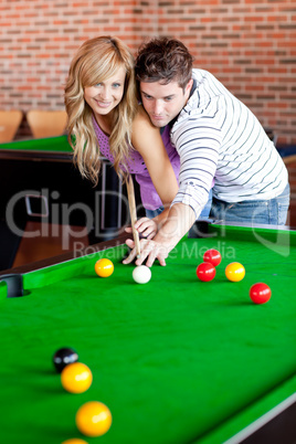 play pool in a club