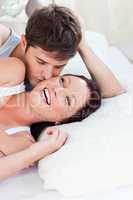 couple lying on bed