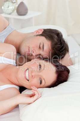 couple lying on bed