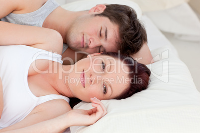 couple lying on bed