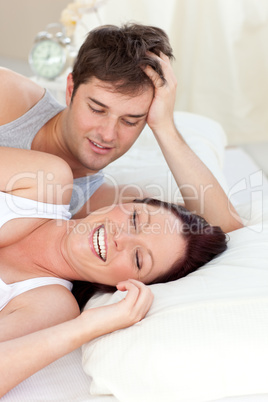 couple lying on bed