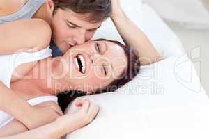 couple lying on bed