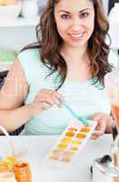 mother preparing food for her baby