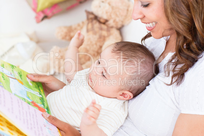 Joyful mother with baby
