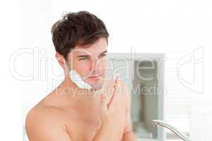 man ready to shave in the bathroom