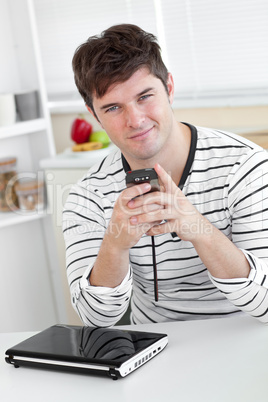 man sending a text message