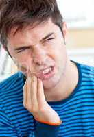 man having a toothache