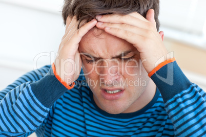 man having a headache