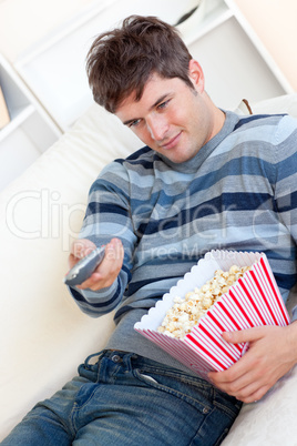 man eating popcorn