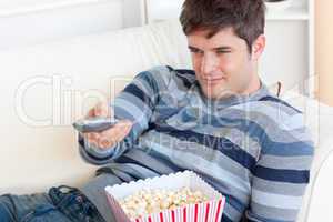 man eating popcorn