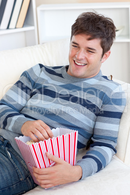 man eating popcorn