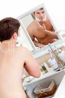man ready to shave in the bathroom
