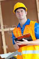 male worker holding a clipboard