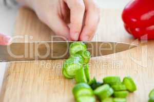 man cutting vegetables in the kitchen