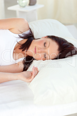 woman sleeping in her bed