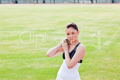 female athlete holding weight