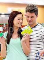 Delighted couple buying products
