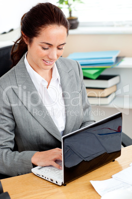 businesswoman working at her laptop