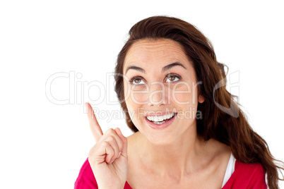 Cheerful hispanic woman pointing upward