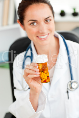 doctor holding pills
