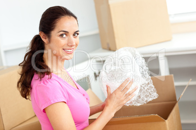 woman unpacking boxes