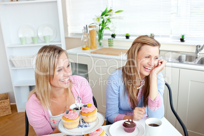 female friends eating pastries