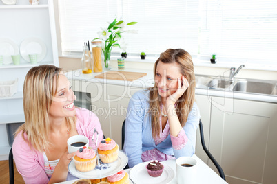 female friends eating pastries