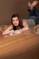 Student series - Young brown hair woman reading book