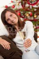 Young woman with glass of champagne
